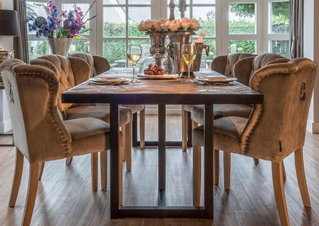 Which is better for your dining area—reclaimed dining tables or regular tables?