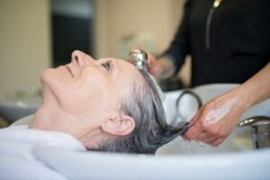 Why Do Salons Wash Your Hair After Coloring?