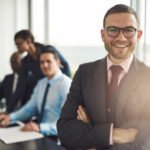 Confident Business Executive With Folded Arms